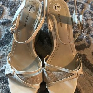 White, wedged sandals.